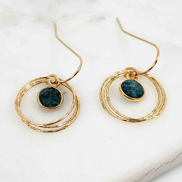 Round Emerald Surrounded by Sparkling Intertwined Wire Circle Earrings