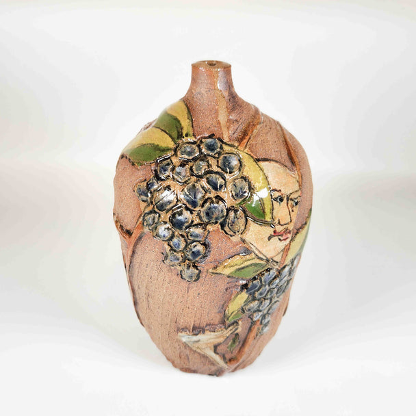 Carved Blueberry Face Bottle