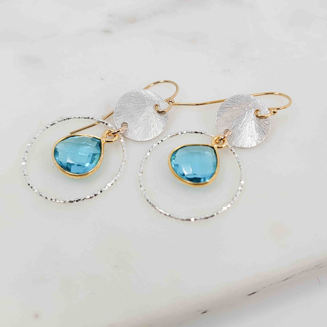 Flat Pear Shaped Blue Topaz Sparkle Mixed Metal Earrings