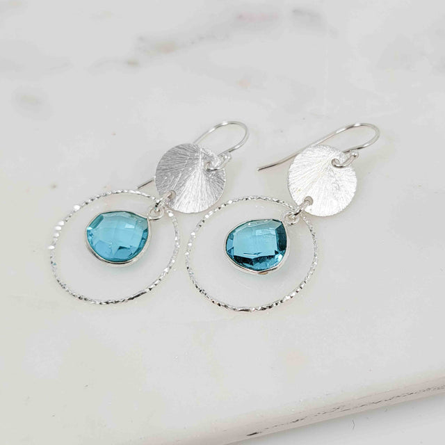 Flat Pear Shaped Blue Topaz Sparkle Earrings