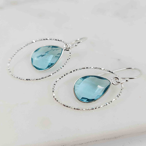 Pear Shaped Blue Topaz Halo Circle Earrings