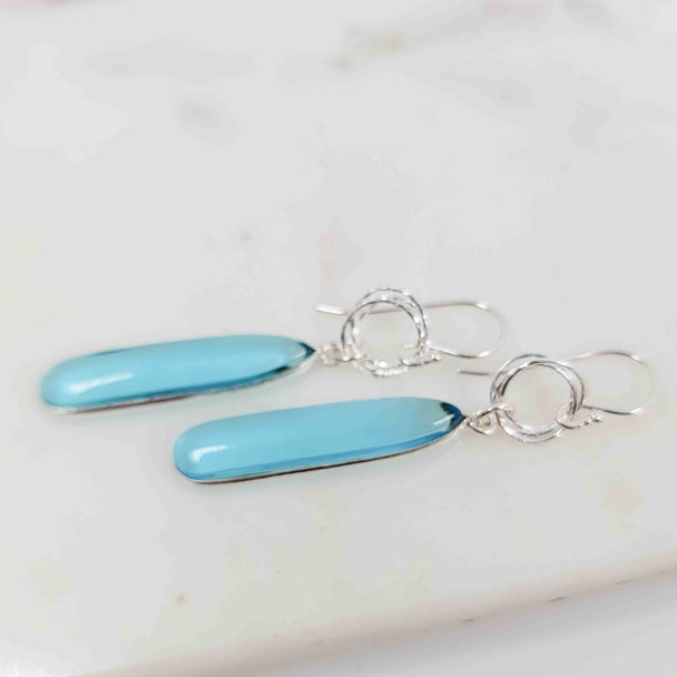 Cabochon Teardrop Shaped Blue Topaz Triple Sparkle Circle Drop Earrings