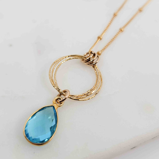 Pear Shaped Blue Topaz Triple Circle Sparkle Drop with Triple Bail Gold Fill Necklace