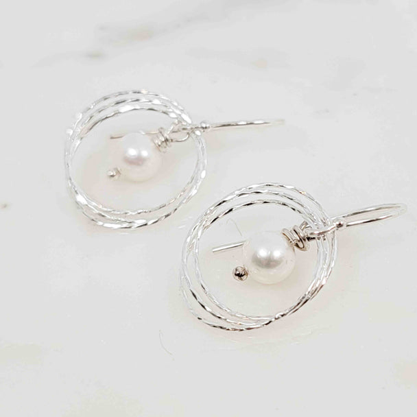 White Pearl Surrounded by Triple Sparkle Circles Earrings