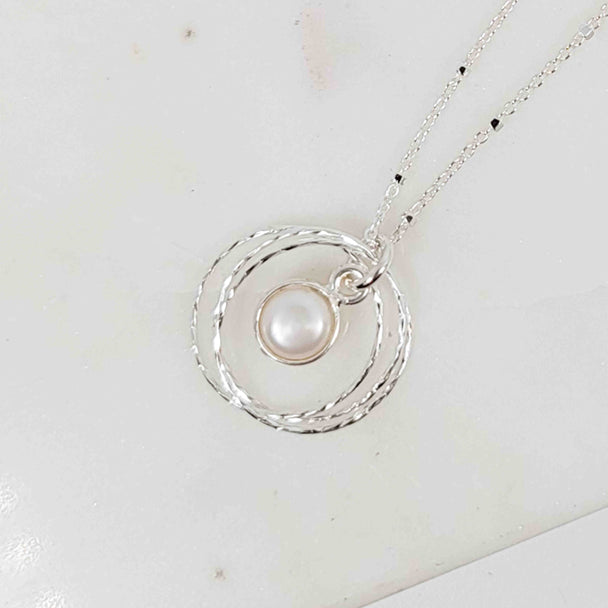 Silver Bezel Wrapped White Pearl Triple Circle Sparkle Necklace