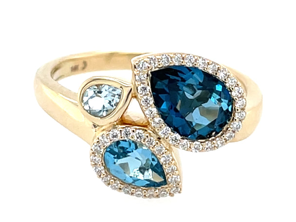 Pear Shaped Blue Topaz and Diamond Halo Ring