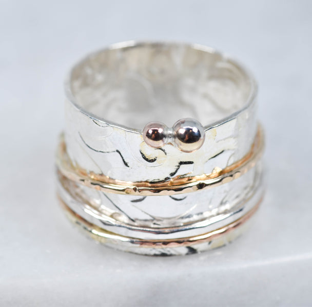 Gold and Silver Spinner Ring X