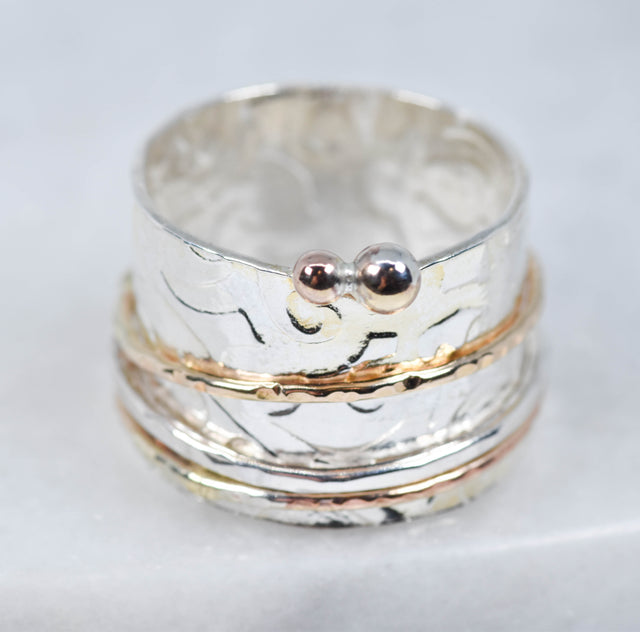 Gold and Silver Spinner Ring X