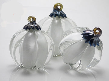 Three White and Clear Glass pumpkins with colored stems
