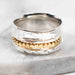 Slant Rivet Spinner Ring