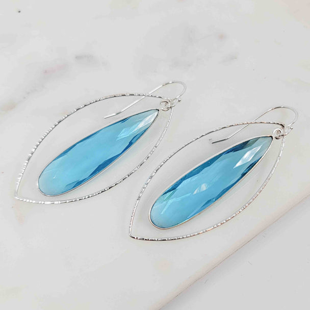 Teardrop Shaped Blue Topaz Open Round-Wire Oval Petal with Textured Metal Surround Dangle Earrings