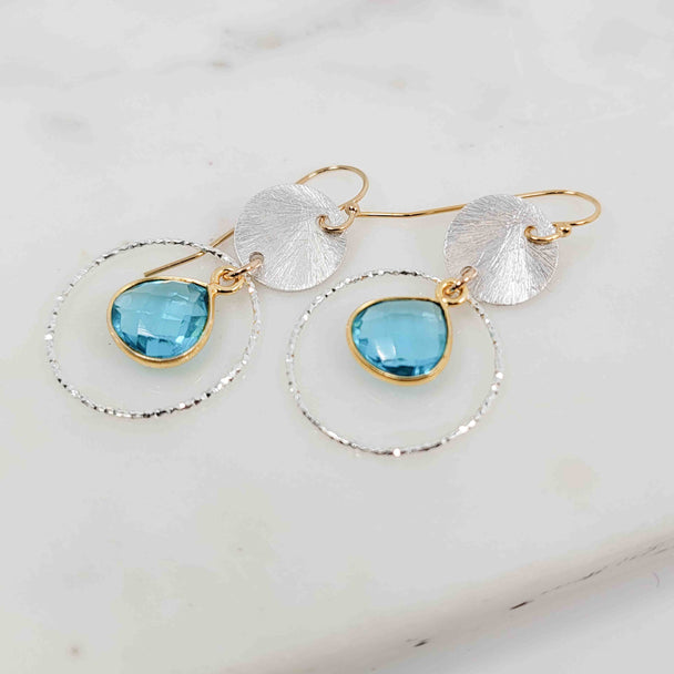 Flat Pear Shaped Blue Topaz Sparkle Mixed Metal Earrings