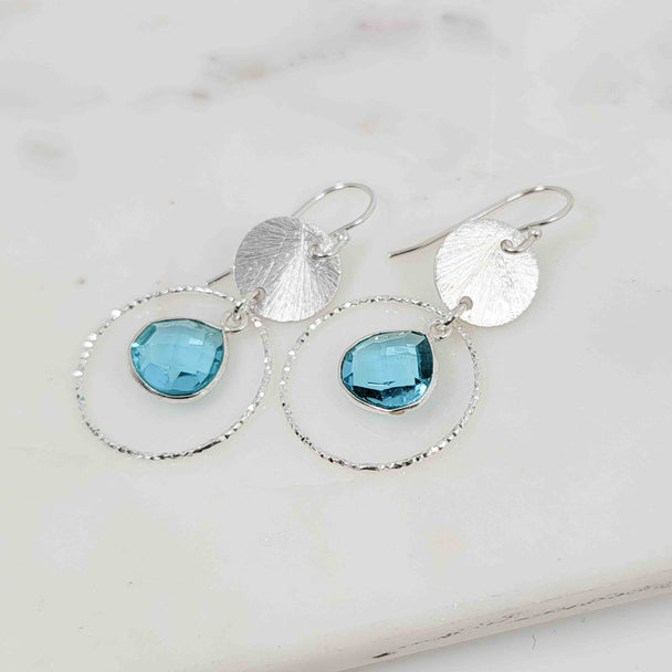 Flat Pear Shaped Blue Topaz Sparkle Earrings