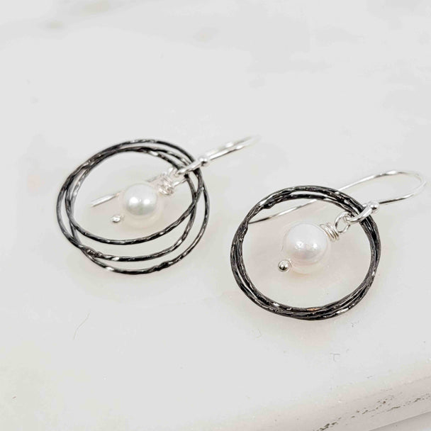 White Pearl Surrounded by Triple Sparkle Circles Oxidized Earrings