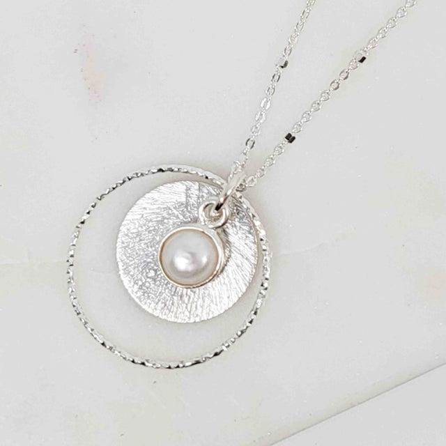 Silver Bezel Wrapped White Pearl Sparkle Halo Layered Disc Necklace