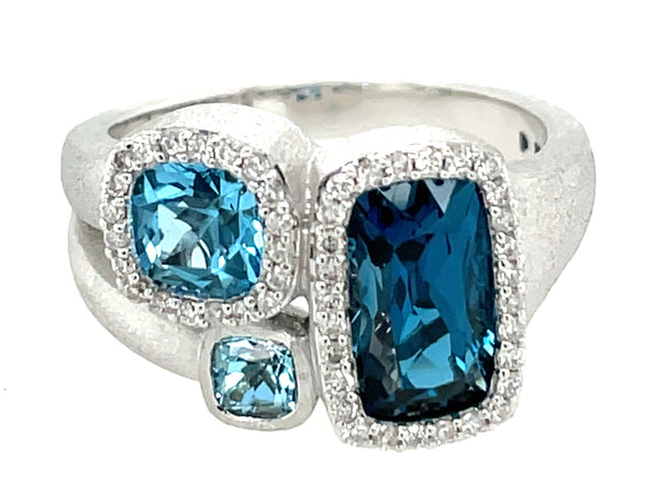 Blue Topaz Cushion 3 Stone and Diamond Ring