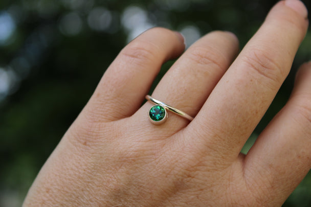 Silver Band Ring with Offset Green Topaz Stone