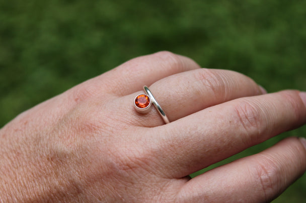 Silver Band Ring with Offset Poppy Topaz Stone