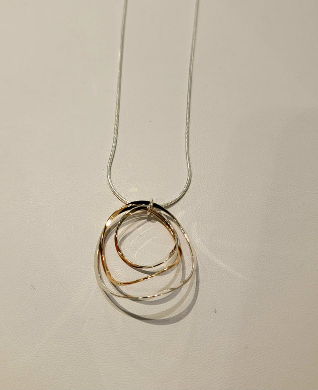 Mixed Metal Wavy Rings Pendant Necklace
