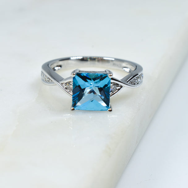 Swiss Blue Topaz and Diamond Ring