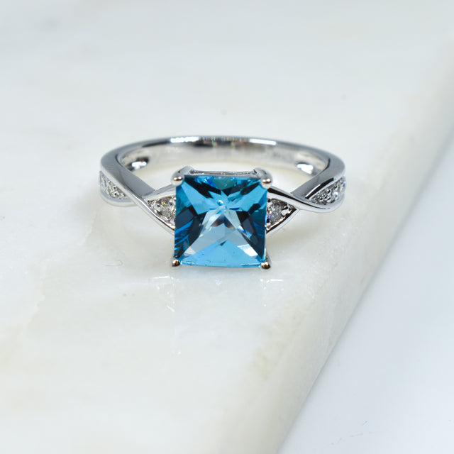 Swiss Blue Topaz and Diamond Ring