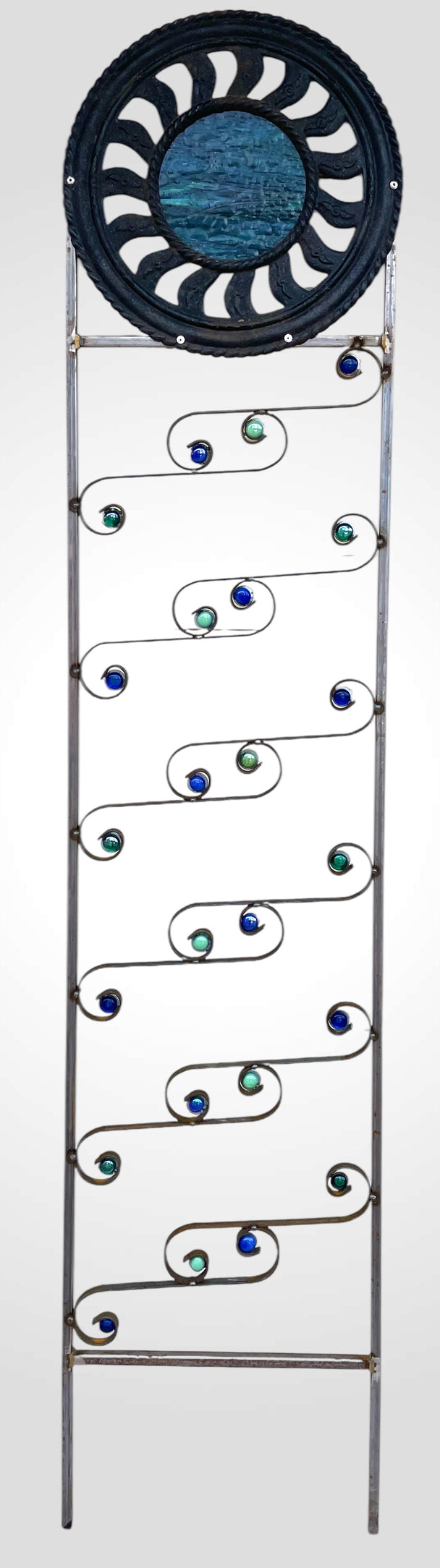 Deep Blue-Green Glass and Antique Grate Trellis