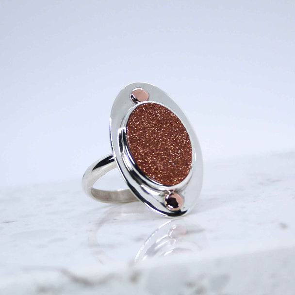 Goldstone and Mixed Metal Ring