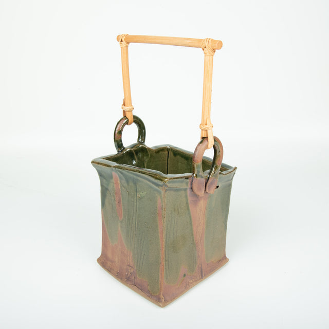 Green Handled Bucket With Red Accents