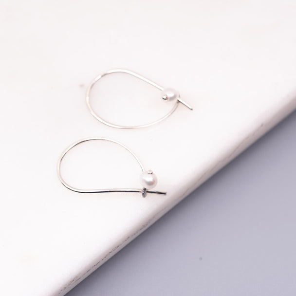 Small Forged Hoop Earrings With White Pearls