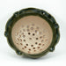 Green and Tan Colander